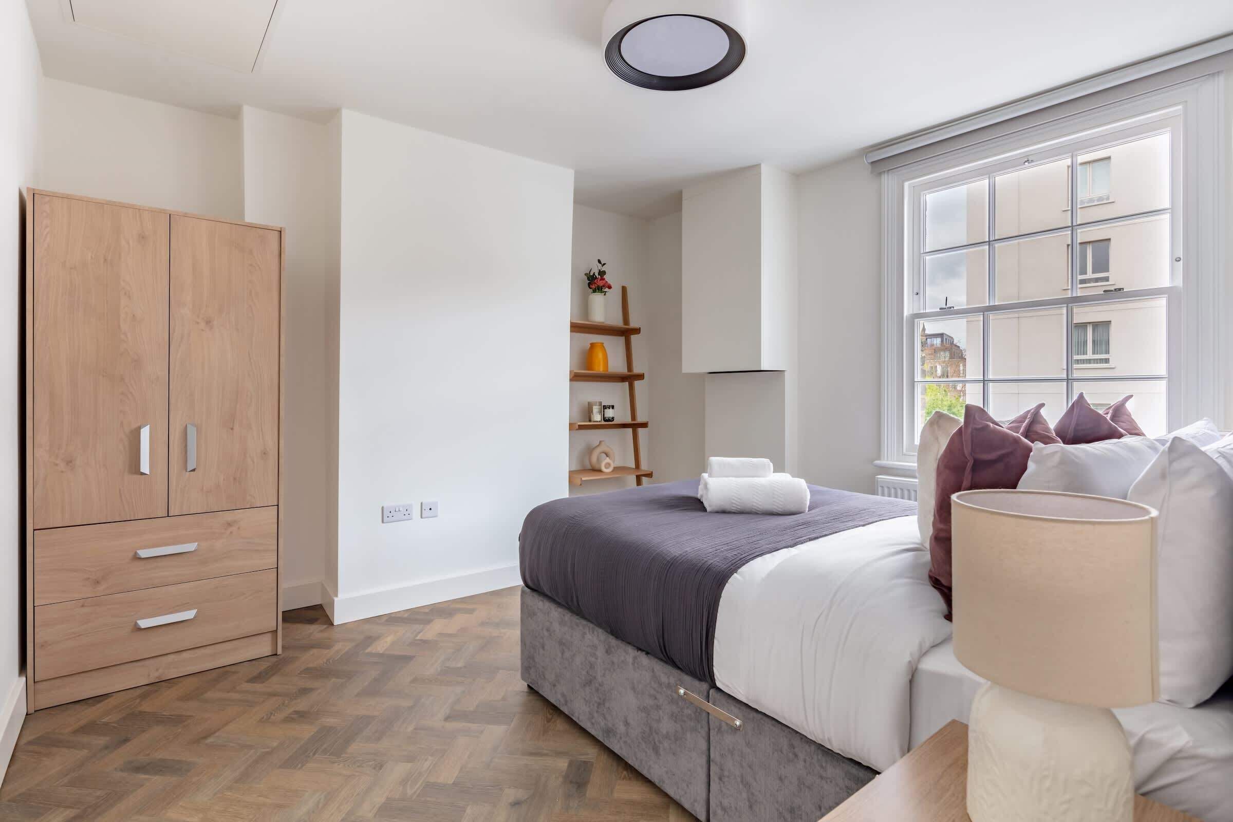 1 bedroom, desk, iron/ironing board, travel crib