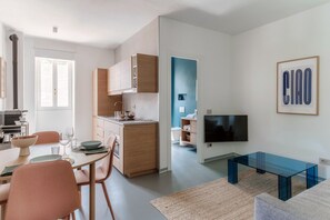 Apartment, Patio, Lake View | Living area | 30-inch TV with digital channels - Olive (Acquaseria)