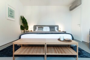 Apartment, Patio, Lake View | Premium bedding, down comforters, iron/ironing board, cribs/infant beds