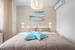 4 habitaciones, tabla de planchar con plancha, wifi y ropa de cama 