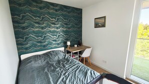 2 bedrooms, desk, iron/ironing board, travel crib