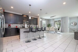 Fridge, microwave, dishwasher, coffee/tea maker