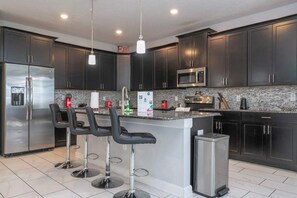 Fridge, microwave, dishwasher, coffee/tea maker