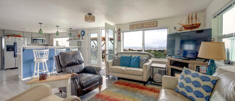 TV, fireplace, books