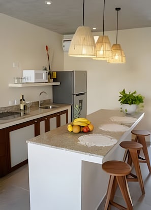 Fridge, microwave, coffee/tea maker, toaster