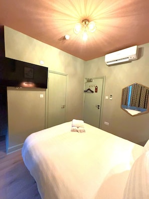 Lower Ground Deluxe Double Room | Egyptian cotton sheets, premium bedding, memory foam beds, free WiFi - The Norfolk (London)
