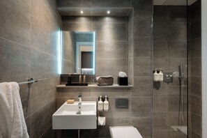 Hair dryer, towels, soap, shampoo