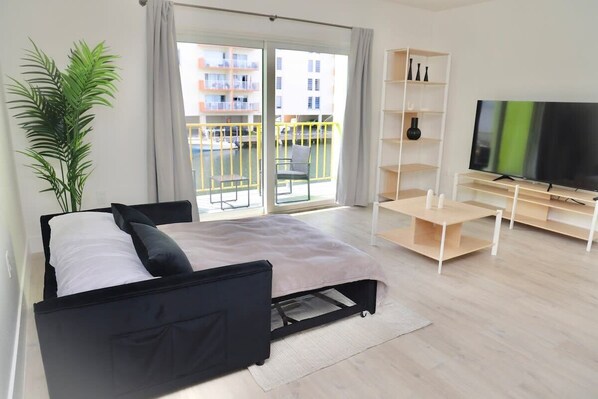 1 dormitorio, tabla de planchar con plancha, cuna de viaje y wifi