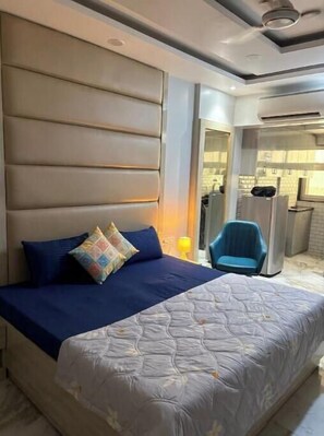 1 slaapkamer, een strijkplank/strijkijzer, wifi, beddengoed