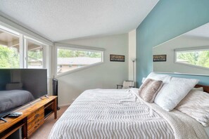 1 bedroom, desk, iron/ironing board, travel crib