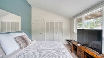1 bedroom, desk, iron/ironing board, travel crib