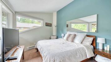 1 bedroom, desk, iron/ironing board, travel crib