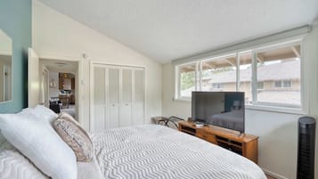 1 bedroom, desk, iron/ironing board, travel crib