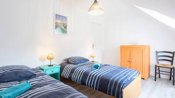 4 slaapkamers, een strijkplank/strijkijzer, beddengoed