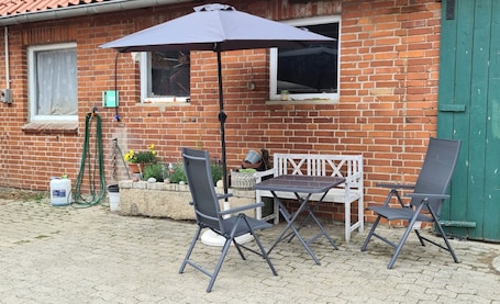 Outdoor dining. Construction trailer on the farm in the Weserbergland