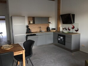 Oven, stovetop, dishwasher, coffee/tea maker