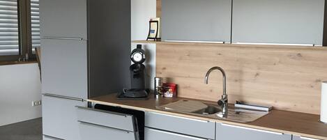 Oven, stovetop, dishwasher, coffee/tea maker