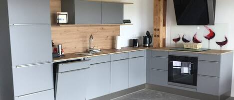 Oven, stovetop, dishwasher, coffee/tea maker