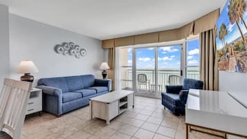 Signature Condo, 2 Bedrooms, Balcony, Beach View | Living room | Flat-screen TV