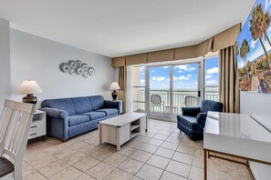 Signature Condo, 2 Bedrooms, Balcony, Beach View | Living room | Flat-screen TV
