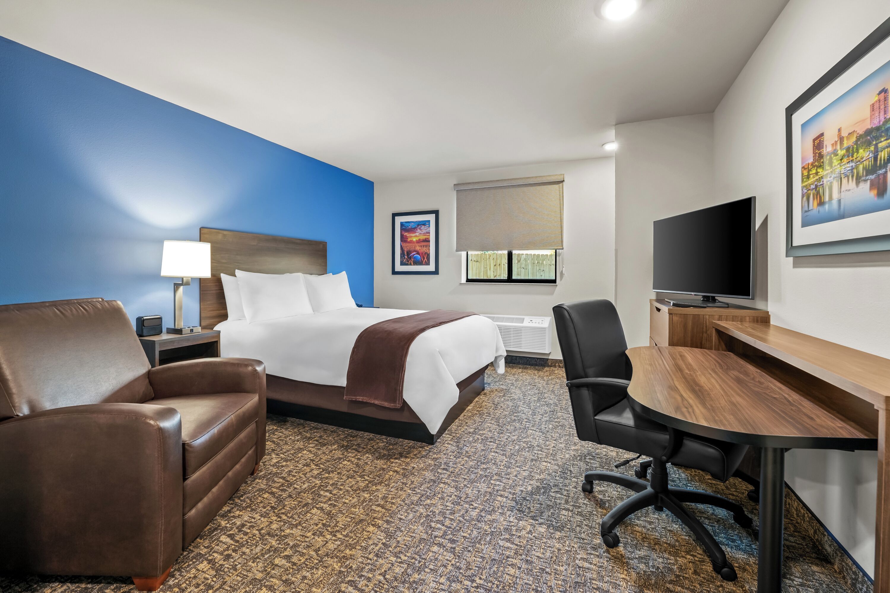 Desk, laptop workspace, blackout drapes, iron/ironing board