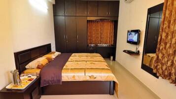 2 habitaciones, tabla de planchar con plancha y ropa de cama