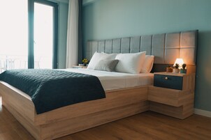 Suite exclusiva, vistas parciales al mar | Wifi gratis y ropa de cama