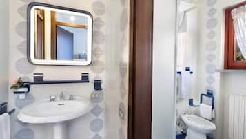 Hair dryer, towels, toilet paper