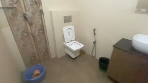Shower, jetted tub, towels, soap