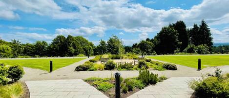 Deluxe resortwoning, uitzicht op tuin | Terras