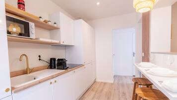 Fridge, microwave, coffee/tea maker, toaster