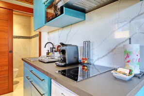 Fridge, microwave, coffee/tea maker, toaster