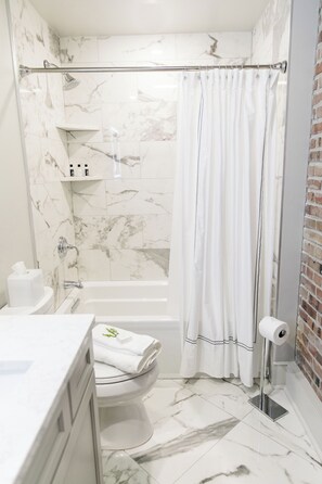 Hair dryer, towels, soap, toilet paper