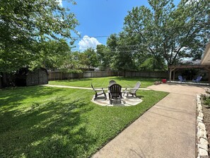 Terrace/patio - Playoff Ready! ~10 Min to Kyle Field! Sleeps 14! King Bed, 72” TV, Big Backyard (College Station)