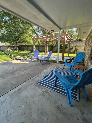 Terrace/patio - Playoff Ready! ~10 Min to Kyle Field! Sleeps 14! King Bed, 72” TV, Big Backyard (College Station)