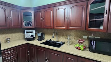 Mini-fridge, toaster, cookware/dishes/utensils