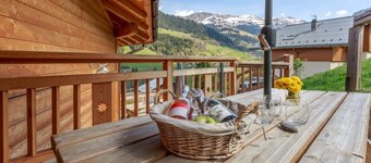 Chalet 'Les Tarines 2' with Mountain View, Private Terrace and Wi-Fi