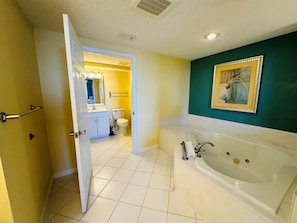 Jetted bath, hair dryer, towels, soap