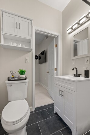 Shower, eco-friendly toiletries, towels, soap
