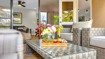 Condo (1 Bedroom) | Living room | 65-inch TV with digital channels