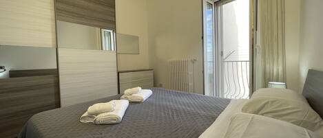 2 habitaciones y ropa de cama