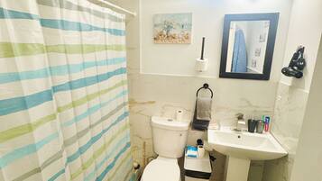 Hair dryer, towels, soap, shampoo