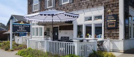 Picture yourself strolling in through this classic beach-town facade.