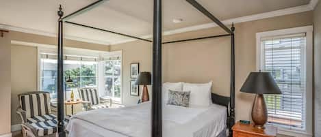 Sink into the canopy bed and wake to soft daylight.