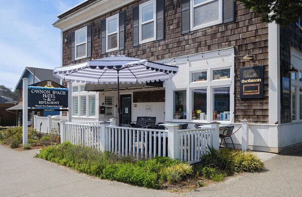 Picture yourself strolling in through this classic beach-town facade.