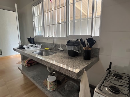Oven, stovetop. Amazing 2-bedroom house in Chapadão do Céu GO.
