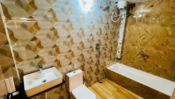 Separate tub and shower, slippers, towels, soap