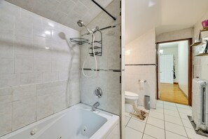 A bathroom with a bathtub, shower, and toilet. - 6 Mi to Boston Common: Apt in Medford! (Medford)