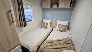 3 bedrooms, free WiFi, bed sheets - Mobil-home 8 personnes situé au camping 4 étoiles Siblu - La Réserve. (Gastes)
