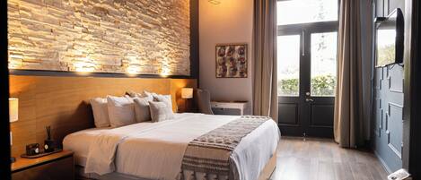 Deluxe Room, City View | Hypo-allergenic bedding, in-room safe, laptop workspace, blackout drapes